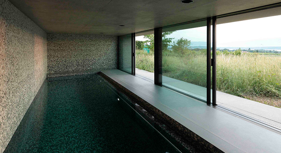 construction piscine intérieure baies coulissantes - Arch and Home